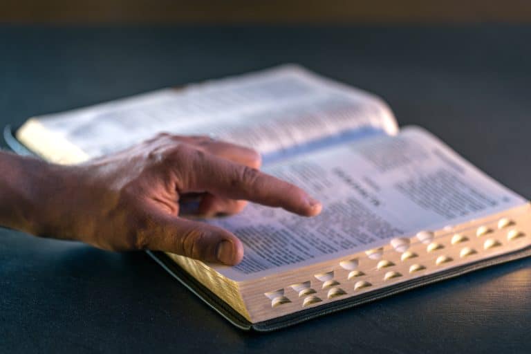 Open Bible and notes reflecting daily christian practice