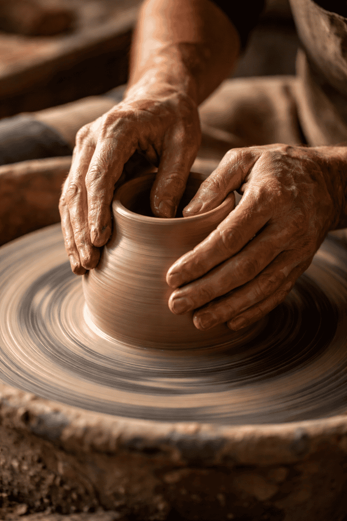 Potter's hands shaping clay on a wheel representing God forming life in the womb and when does the Bible say life begins